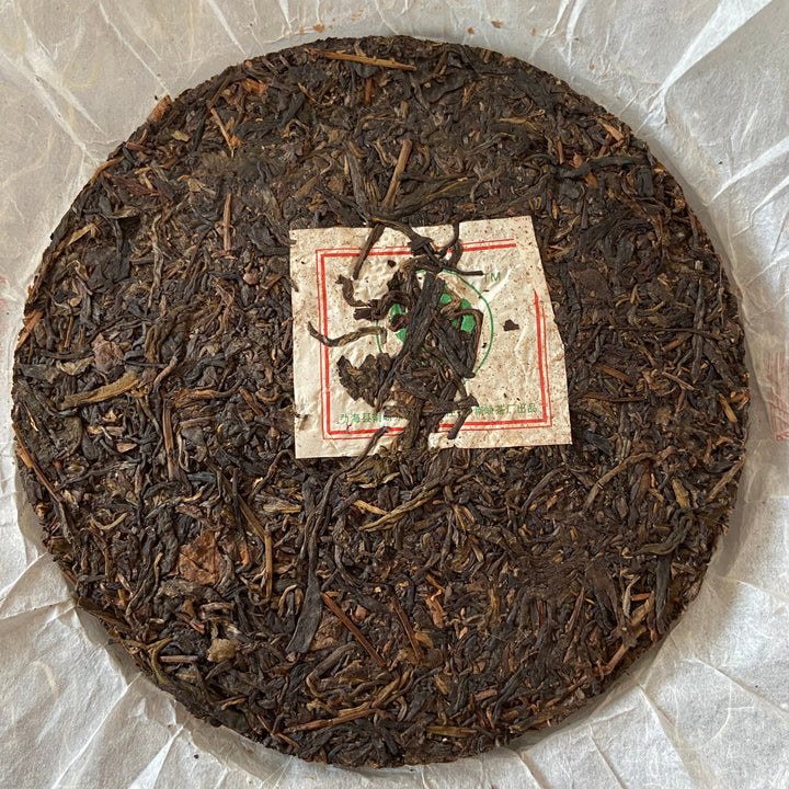 2007 NanQiao "Che Fo Nan-Tie Bing" (Iron Cake) Cake 357g Puerh Raw Tea Sheng Cha, Meng Hai