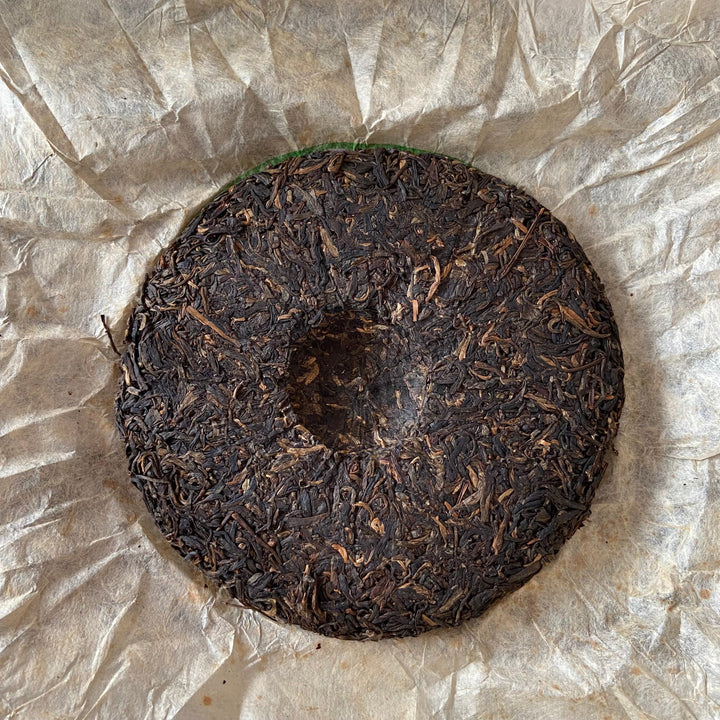 2004 LiMing "Nan Nuo Shan - Gu Qiao Mu" (Nannuo Mountain - Ancient Arbor Tree) Cake 357g Puerh Raw Tea Sheng Cha