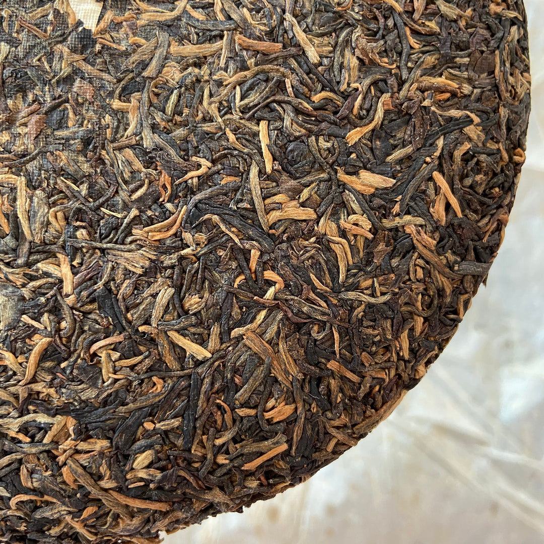 2006 NanQiao "Nan Nuo Yin Hao" (Nannuo mountain - Silver Buds) Cake 250g Puerh Raw Tea Sheng Cha, Meng Hai