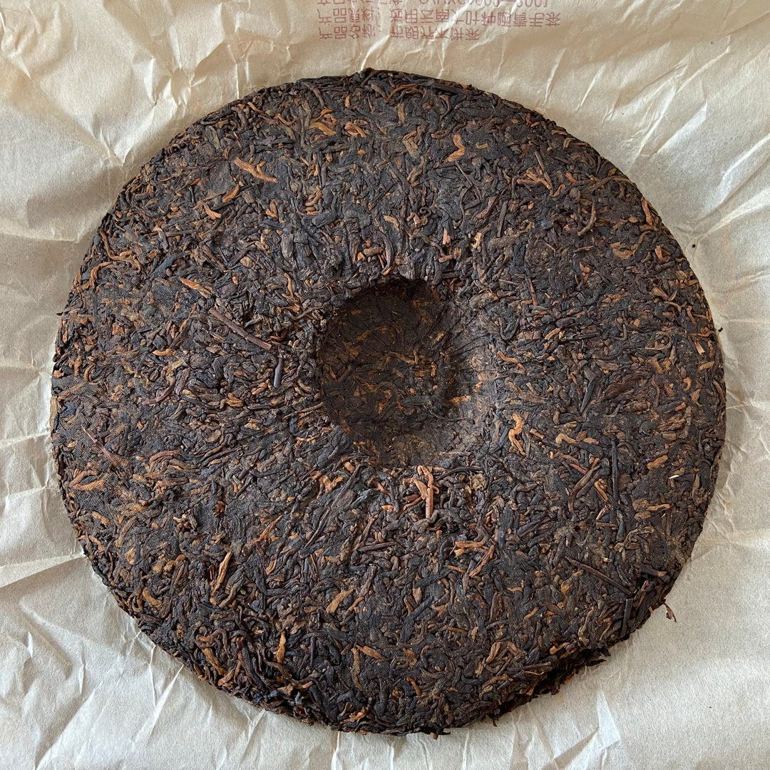 2006 XingHai "Feng - Bu Lang Qiao Mu" (Ballads - Bulang Arbor Tree) Cake 400g Puerh Ripe Tea Shou Cha