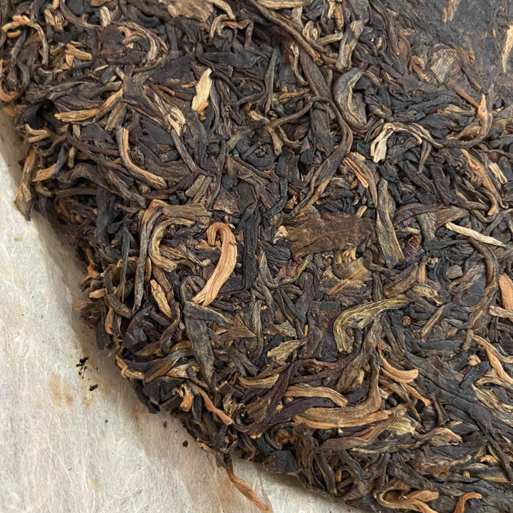 2006 NanQiao ShuangShiHao "Nan Nuo Shan - Ban Po Lao Zhai " (Nannuo Mountain - Banpo Old Village) Cake 357g Puerh Raw Tea Sheng Cha