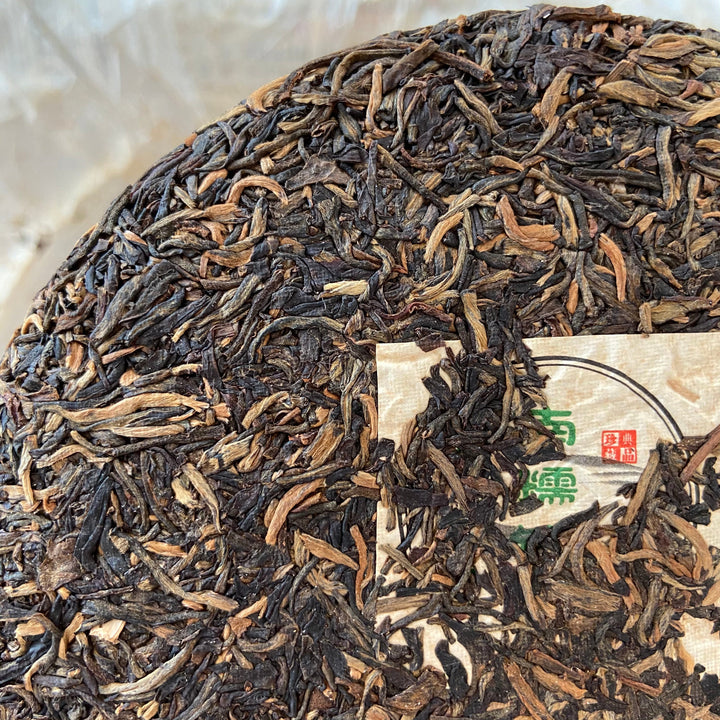 2006 NanQiao "Nan Nuo Yin Hao" (Nannuo mountain - Silver Buds) Cake 250g Puerh Raw Tea Sheng Cha, Meng Hai