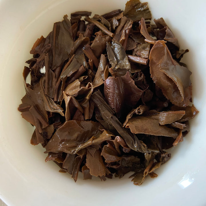 2005 JiXing "Gao Shan Qiao Mu Yu Qian" (High Mountain Arbor Tree Early Spring) Cake 400g Puerh Raw Tea Sheng Cha