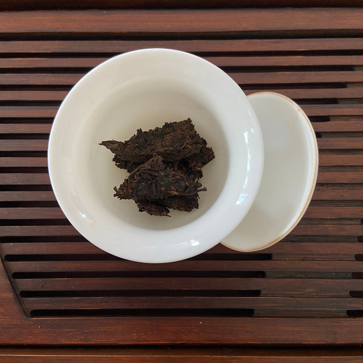 2012 TuLinFengHuang "Qiao Mu - Jin Hao" ( Arbor - Golden Buds) Cake 125g *4pcs  Puerh Shou Cha Ripe Tea