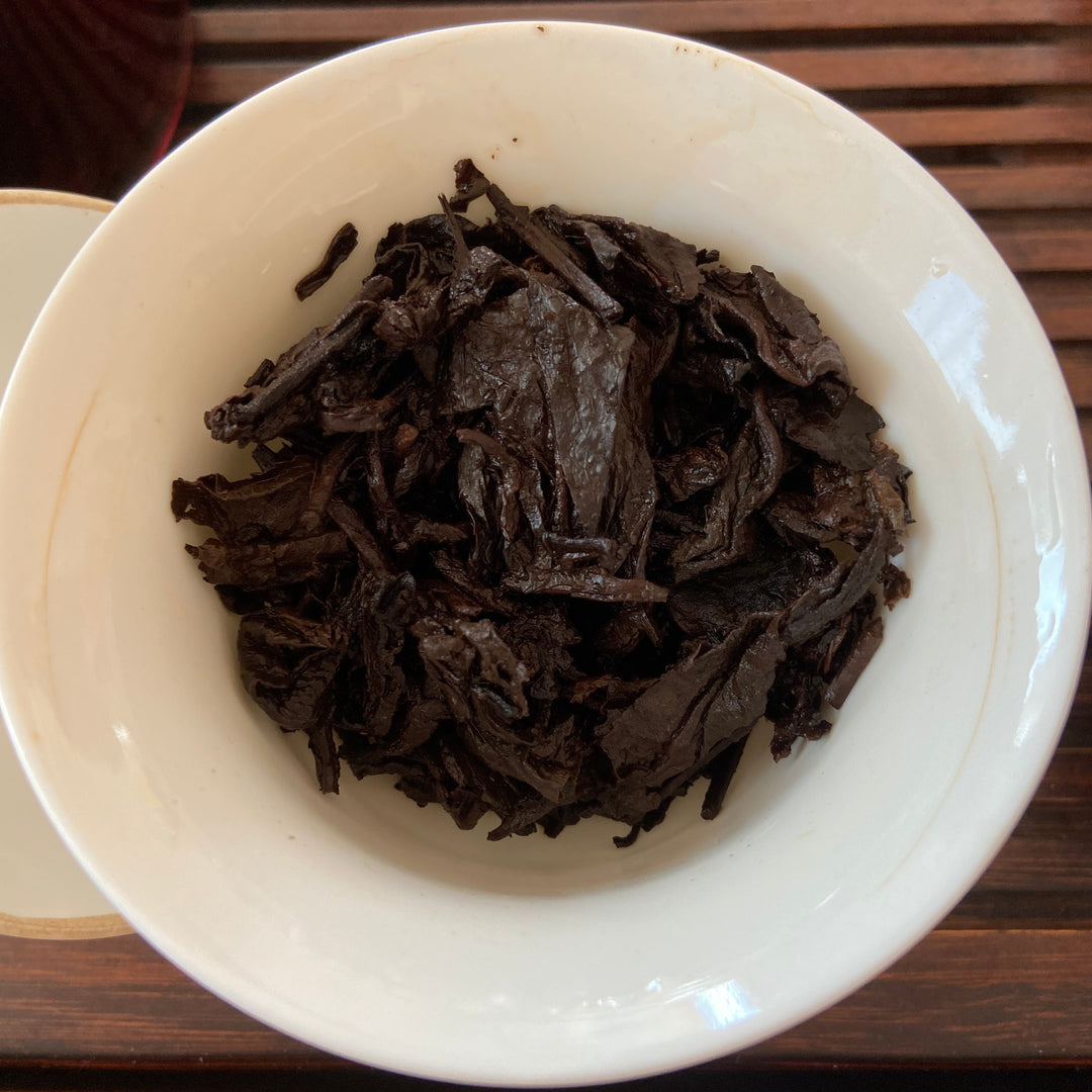 2005 XingHai "Yin Kong Que - Gu Shu Qiao Mu" (Silvers Peacock - Menghai Old Arbor Tree) 501 Batch Cake 357g Puerh Ripe Tea Shou Cha
