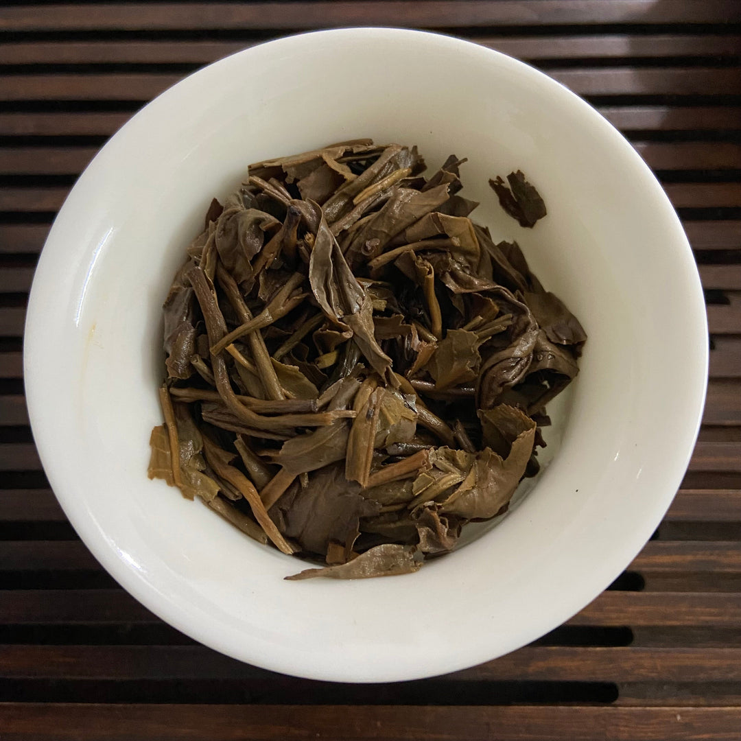 2006 NanQiao ShuangShiHao "Nan Nuo Shan - Ban Po Lao Zhai " (Nannuo Mountain - Banpo Old Village) Cake 357g Puerh Raw Tea Sheng Cha