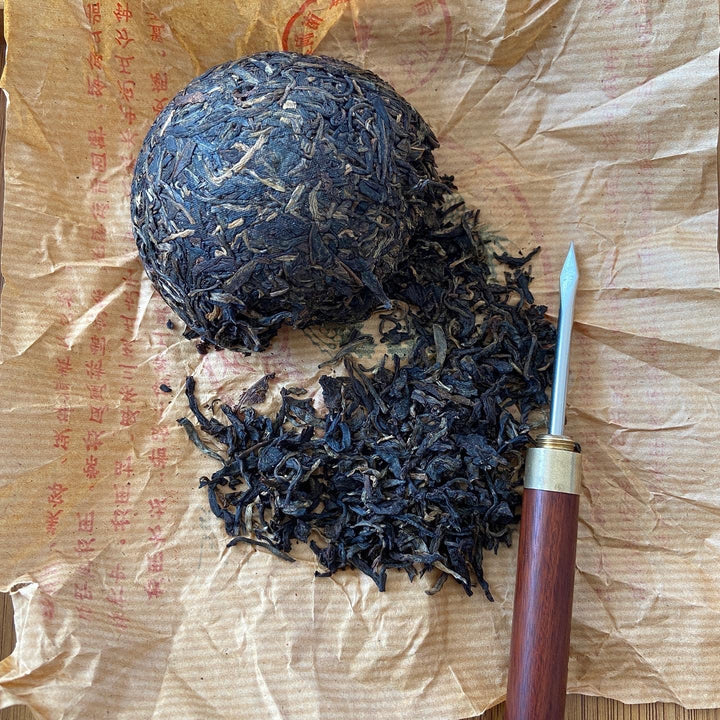 2003 TuLinFengHuang "10 Zhou Nian - Qian Ming " (10th Year’s Commemoration of Recovery- Signed) Tuo 100g Puerh Sheng Cha Raw Tea