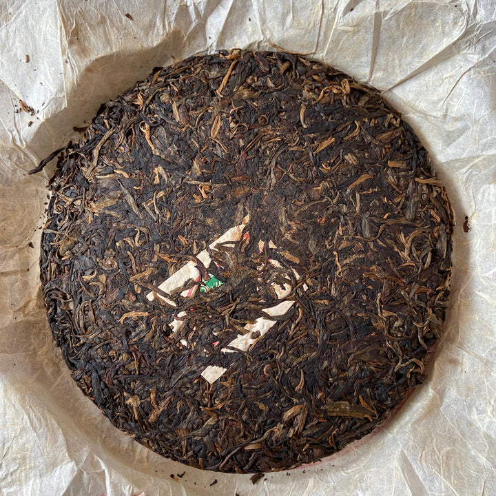 2006 NanQiao "De He Xing - Jia Ji Yin Cha" (DX - 1st Grade Mark) 601 Batch Cake 357g Puerh Raw Tea Sheng Cha, Meng Hai