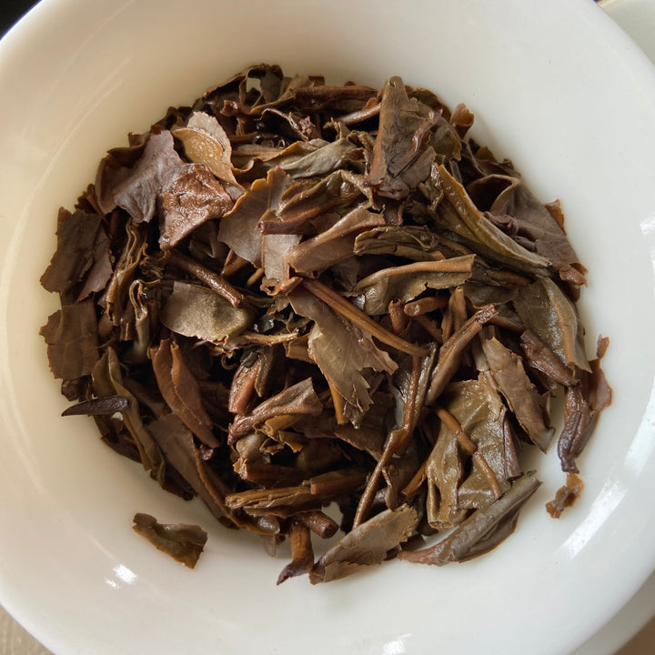 2005 XingHai "Bu Lang - Mei Hua Bing" (Bulang - Plum Flower Cake) 357g Puerh Raw Tea Sheng Cha