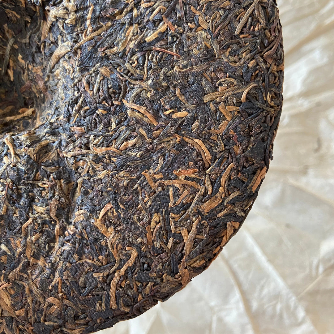 2005 NanQiao "Qiao Mu Ye Sheng - Yin Zhen Gong Bing" (Wild Arbor - Silver Needle Tribute Cake) 250g Puerh Raw Tea Sheng Cha, Meng Hai