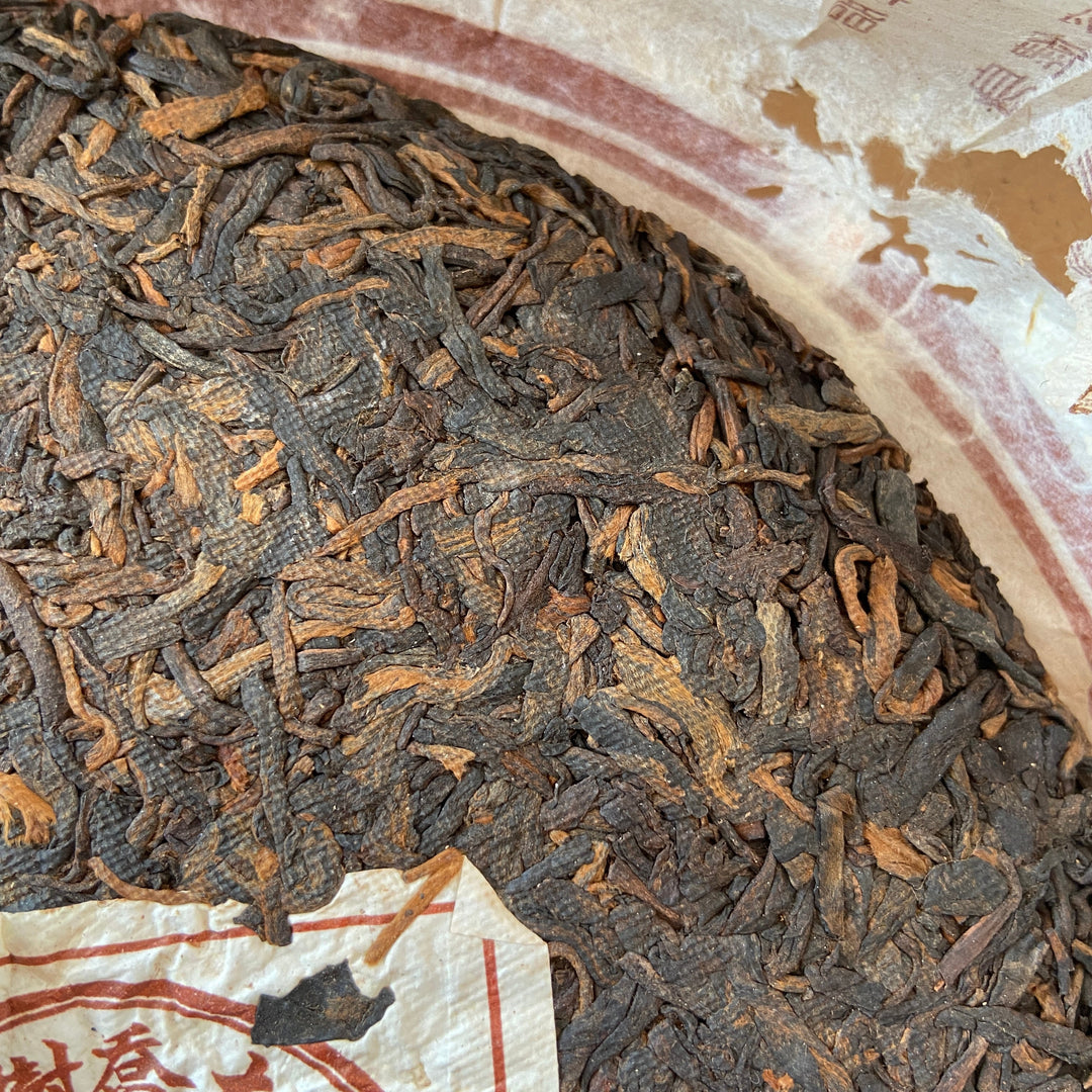2005 XingHai "Yin Kong Que - Gu Shu Qiao Mu" (Silvers Peacock - Menghai Old Arbor Tree) 501 Batch Cake 357g Puerh Ripe Tea Shou Cha