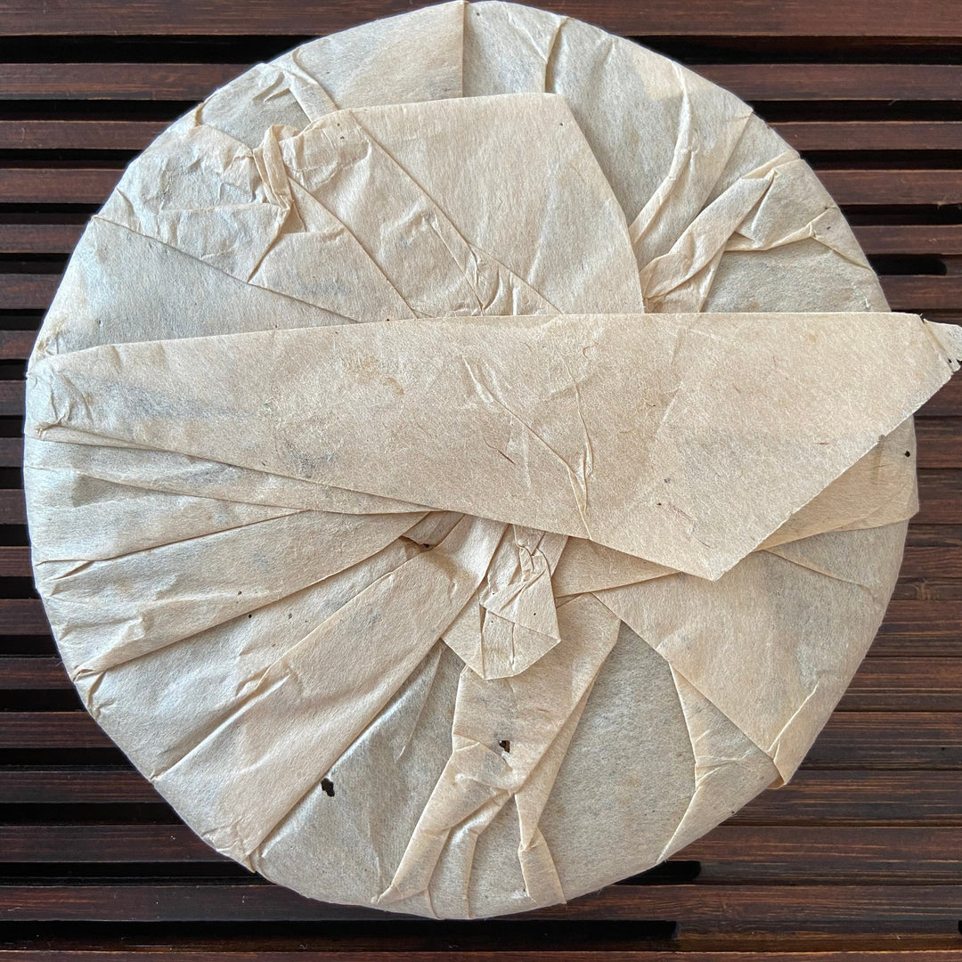2005 NanQiao "Qiao Mu Ye Sheng - Yin Zhen Gong Bing" (Wild Arbor - Silver Needle Tribute Cake) 250g Puerh Raw Tea Sheng Cha, Meng Hai