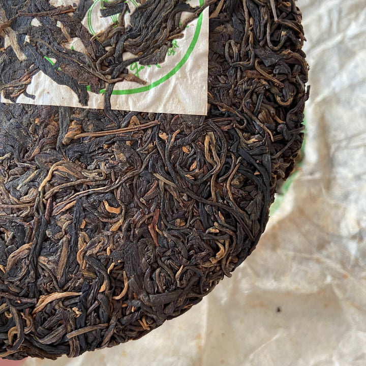 2004 LiMing "Nan Nuo Shan - Gu Qiao Mu" (Nannuo Mountain - Ancient Arbor Tree) Cake 357g Puerh Raw Tea Sheng Cha