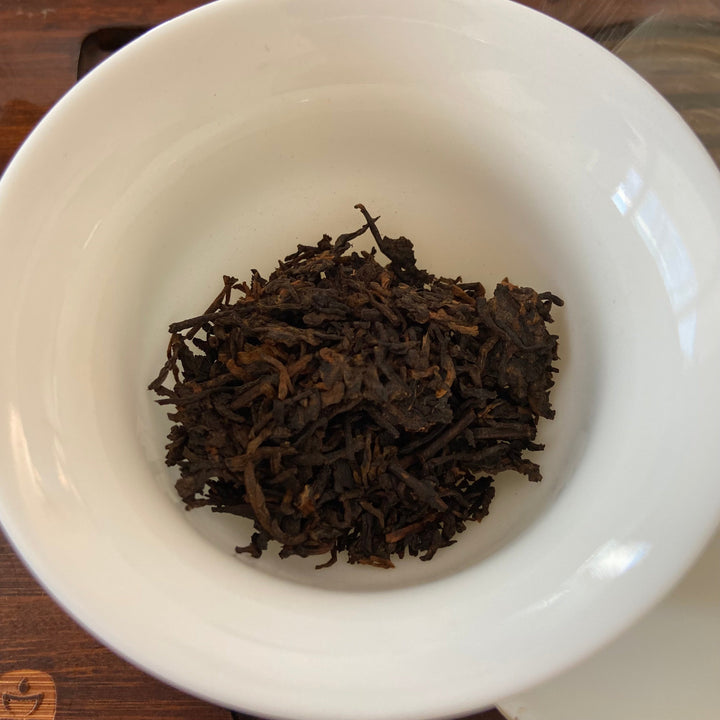 2006 XingHai "Feng - Bu Lang Qiao Mu" (Ballads - Bulang Arbor Tree) Cake 400g Puerh Ripe Tea Shou Cha