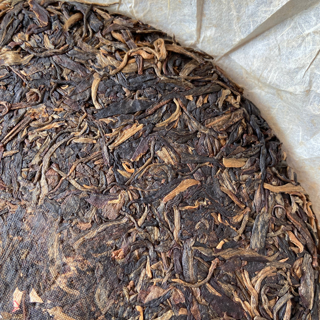 2006 NanQiao "De He Xing - Jia Ji Yin Cha" (DX - 1st Grade Mark) 601 Batch Cake 357g Puerh Raw Tea Sheng Cha, Meng Hai