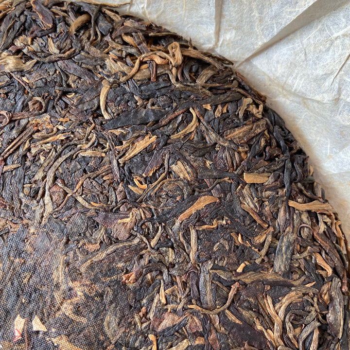 2006 NanQiao "De He Xing - Jia Ji Yin Cha" (DX - 1st Grade Mark) 601 Batch Cake 357g Puerh Raw Tea Sheng Cha, Meng Hai