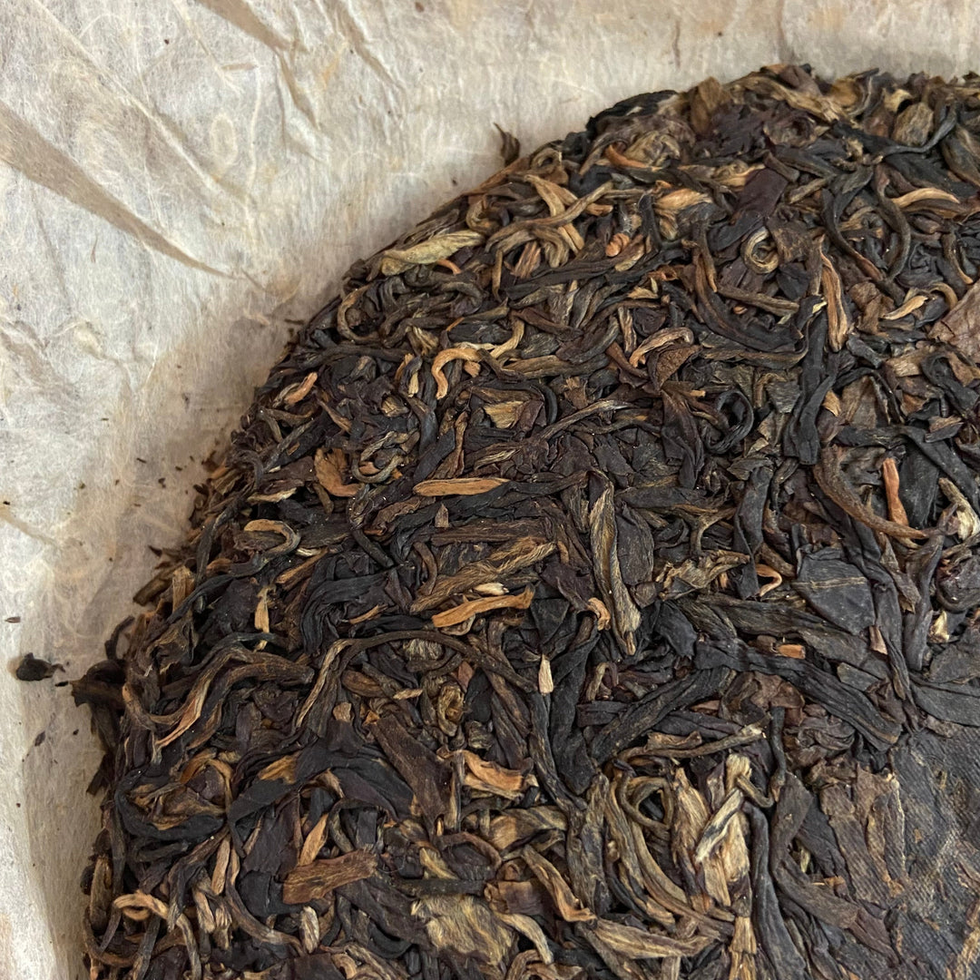 2006 NanQiao ShuangShiHao "Nan Nuo Shan - Ban Po Lao Zhai " (Nannuo Mountain - Banpo Old Village) Cake 357g Puerh Raw Tea Sheng Cha