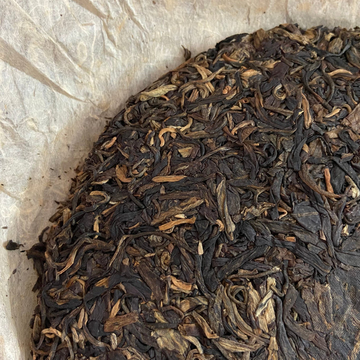 2006 NanQiao ShuangShiHao "Nan Nuo Shan - Ban Po Lao Zhai " (Nannuo Mountain - Banpo Old Village) Cake 357g Puerh Raw Tea Sheng Cha