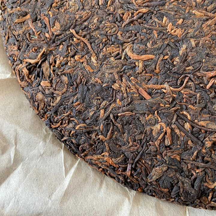2006 XingHai "Feng - Bu Lang Qiao Mu" (Ballads - Bulang Arbor Tree) Cake 400g Puerh Ripe Tea Shou Cha