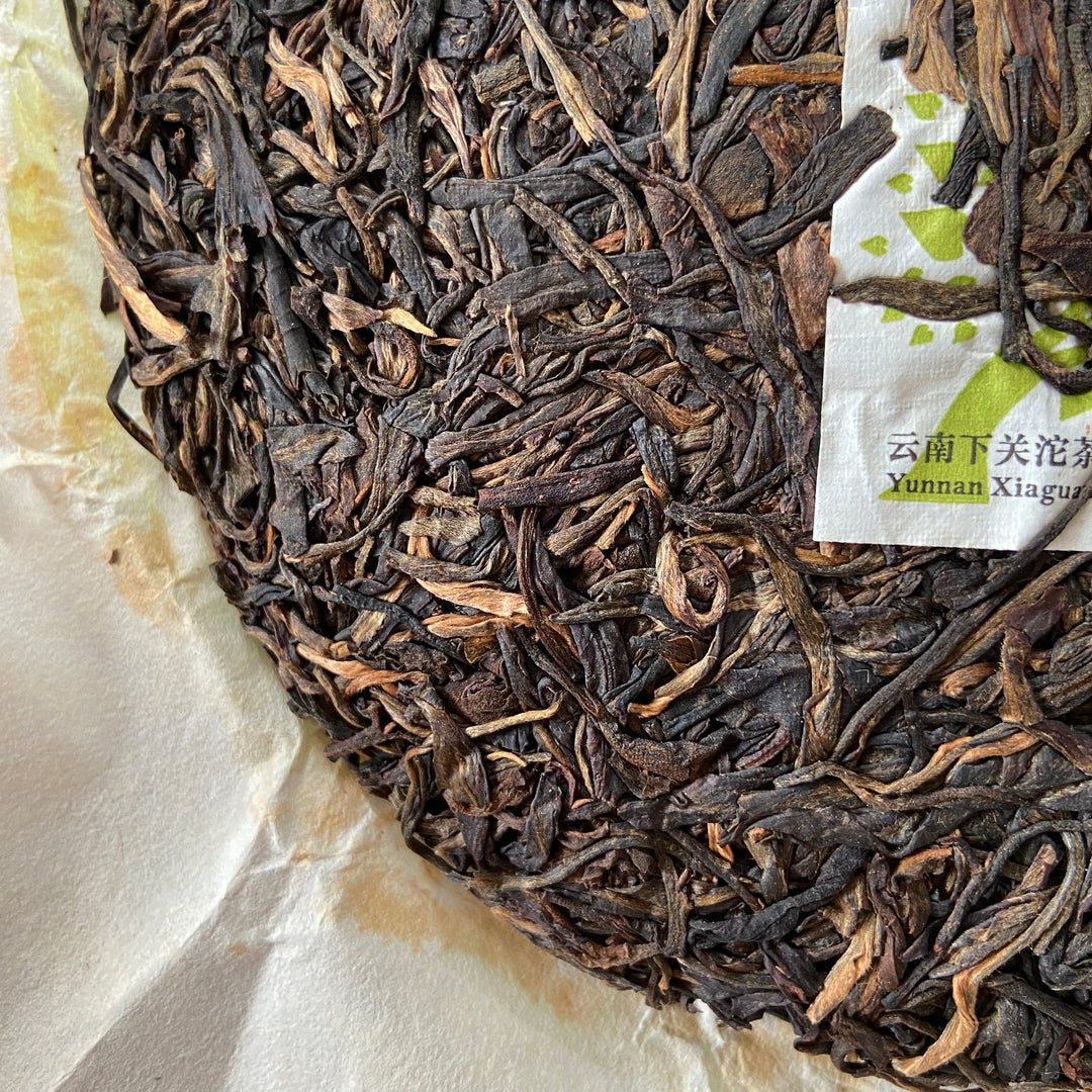 2015 XiaGuan "Yi Wu Zhi Chun" (Spring of Yiwu) Cake 357g Puerh Sheng Cha Raw Tea