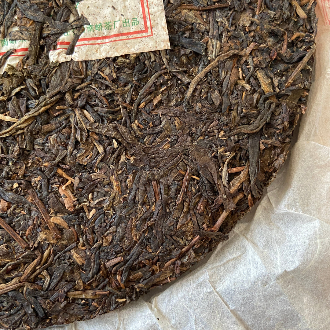 2007 NanQiao "Che Fo Nan-Tie Bing" (Iron Cake) Cake 357g Puerh Raw Tea Sheng Cha, Meng Hai