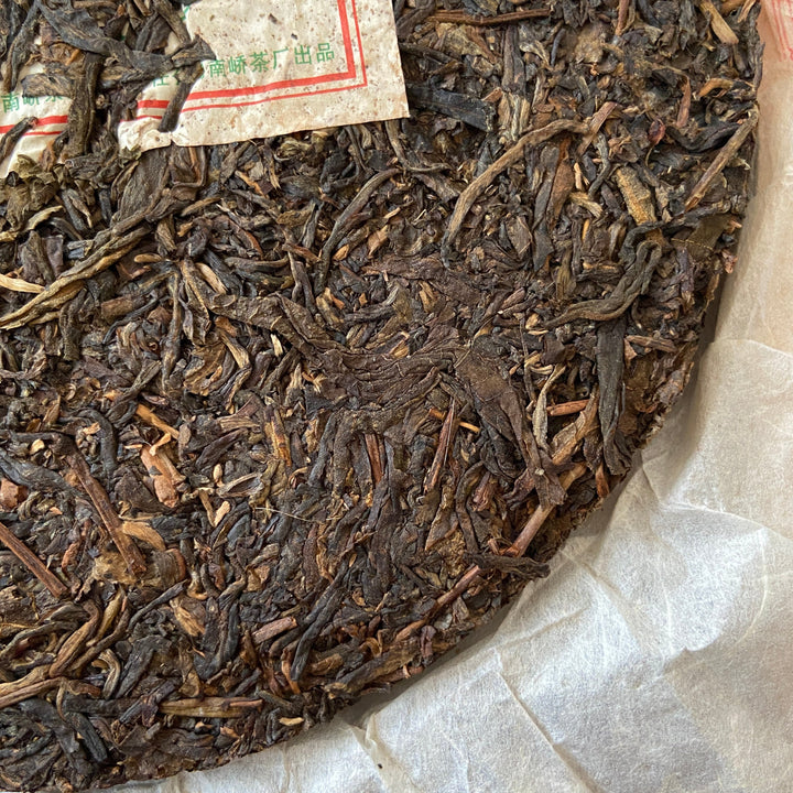 2007 NanQiao "Che Fo Nan-Tie Bing" (Iron Cake) Cake 357g Puerh Raw Tea Sheng Cha, Meng Hai