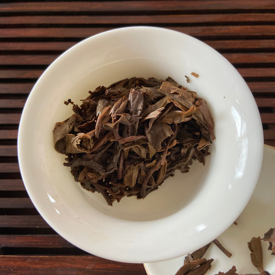 2006 LaoTongZhi "Ming Qian - Chun Jian Cha" (Early Spring Bud - Signed Version) Cake 357g Puerh Sheng Cha Raw Tea