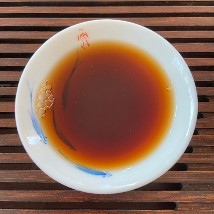 2005 XingHai "Yin Kong Que - Gu Shu Qiao Mu" (Silvers Peacock - Menghai Old Arbor Tree) 501 Batch Cake 357g Puerh Ripe Tea Shou Cha