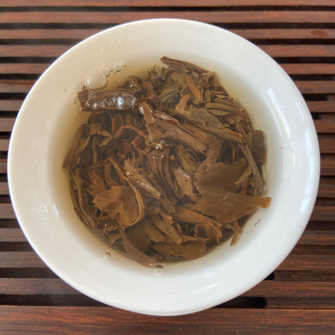 2003 TuLinFengHuang "10 Zhou Nian - Qian Ming " (10th Year’s Commemoration of Recovery- Signed) Tuo 100g Puerh Sheng Cha Raw Tea