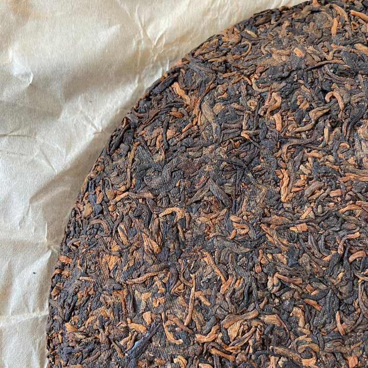 2006 XingHai "Feng - Bu Lang Qiao Mu" (Ballads - Bulang Arbor Tree) Cake 400g Puerh Ripe Tea Shou Cha